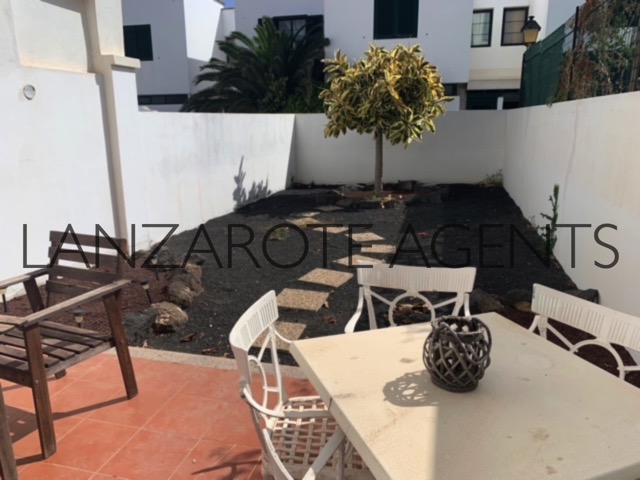 Duplex 2 Bedroom Apartment for sale in Lanzarote in the Light House Area of Playa Blanca, with Terrace and Garden