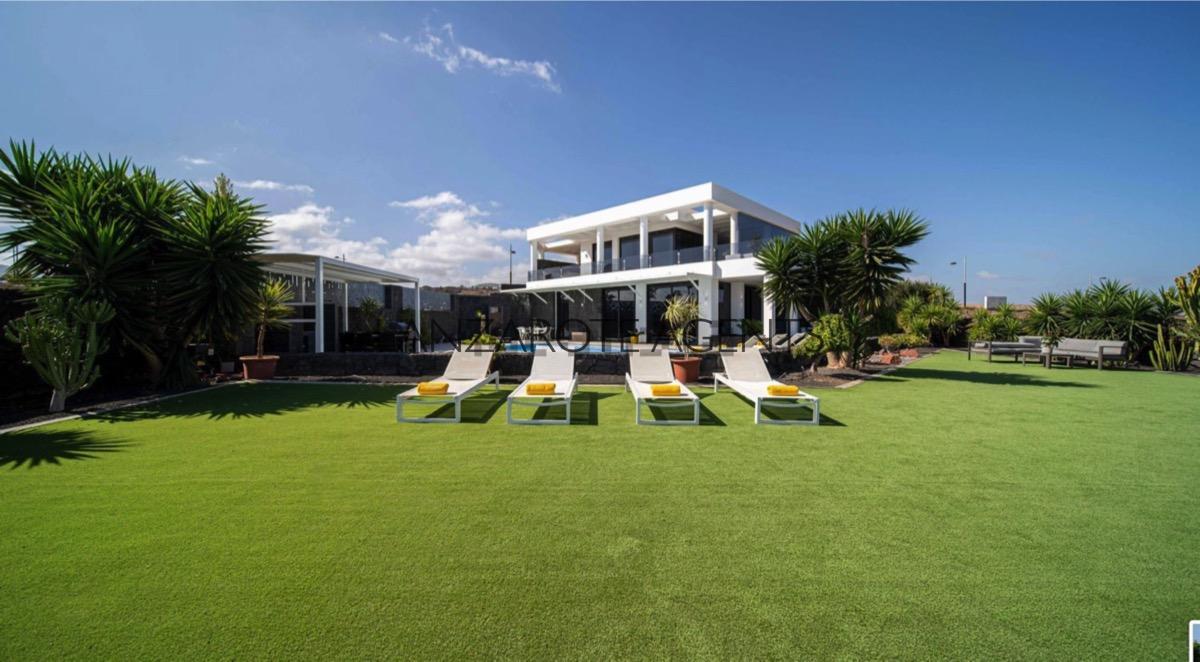 Impecable Detached Modern Luxury Villa in the Exclusive Tias Golf Course with Private Pool and Panoramic Sea Views