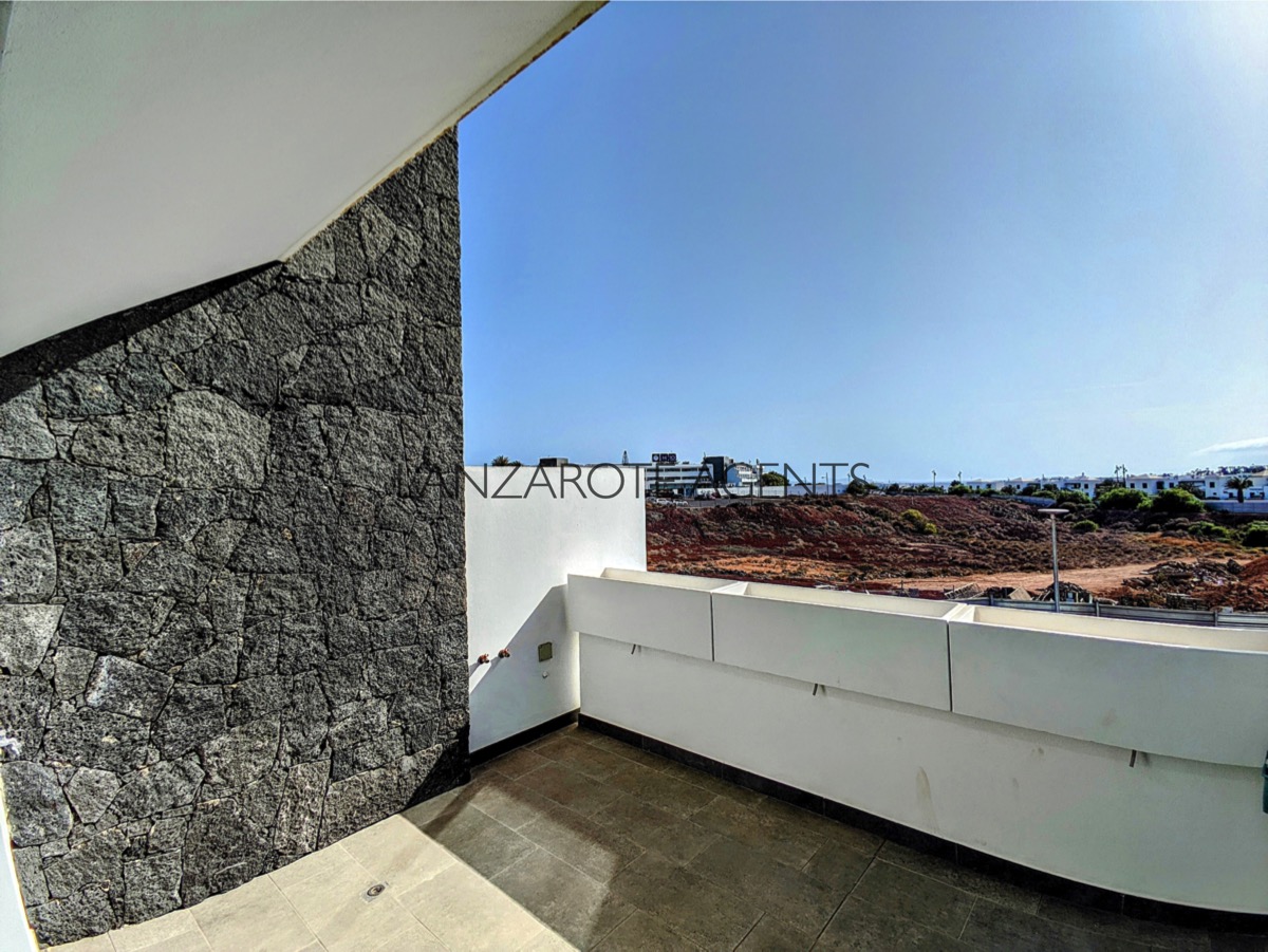 Playa Blanca Town Centre Terraced Newly Built 3 Bedroom Duplex Apartment with Garage and Storage Room