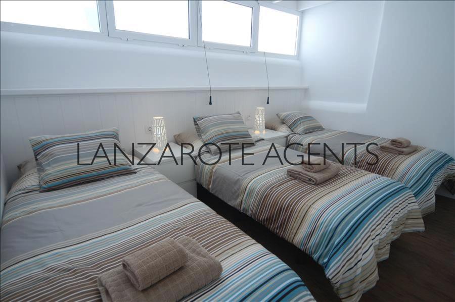 Marina Azul triple bedroom7072d070-fd41-43e7-933f-ee3ed2d0cb3e