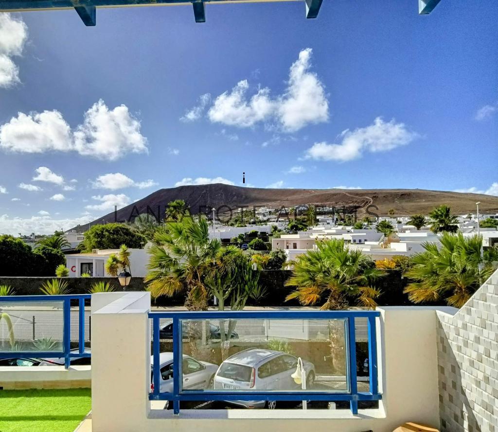 Immaculate modern, completely renovated apartment with south-west facing terrace with spectacular views to Montaña Roja and sun all day close to amenities for sale in well kept community